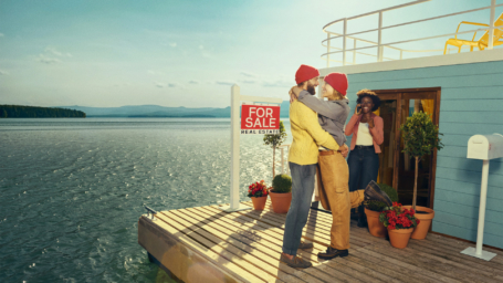 REALTOR showing a couple their new boat home